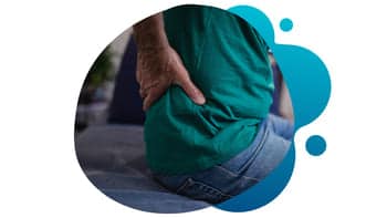 Axial Spondyloarthritis – Conquest-Research-clinical-trial The lower back of a person representing axial spondyloarthritis