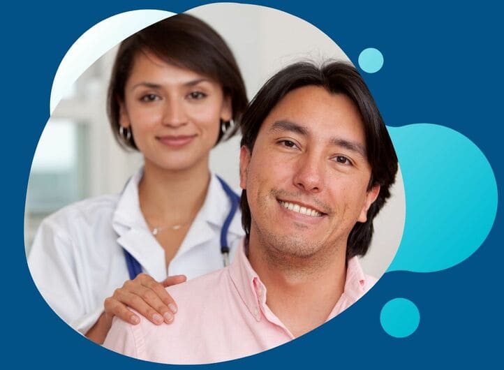 A female doctor and her male patient smiling
