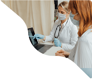 Doctor and nurse reviewing patient health records