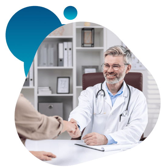 Doctor shaking hands with the patient.