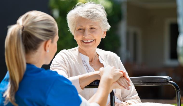 The patient smiles warmly at the doctor