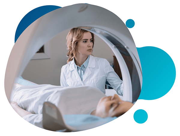 Female doctor performing a MRI scan at clinical research facility Conquest Research