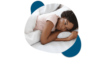 Website Element – Depression (11) Tired woman lying on bed struggling with fatigue