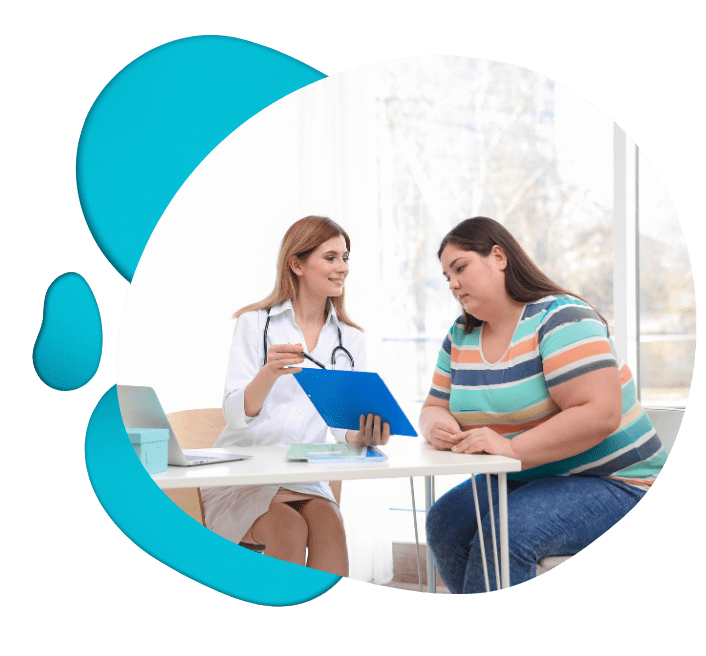 woman speaking with obese woman about her health