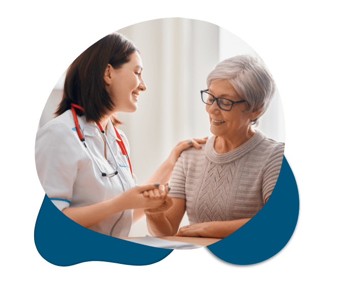Doctor consulting elderly woman during a medical visit